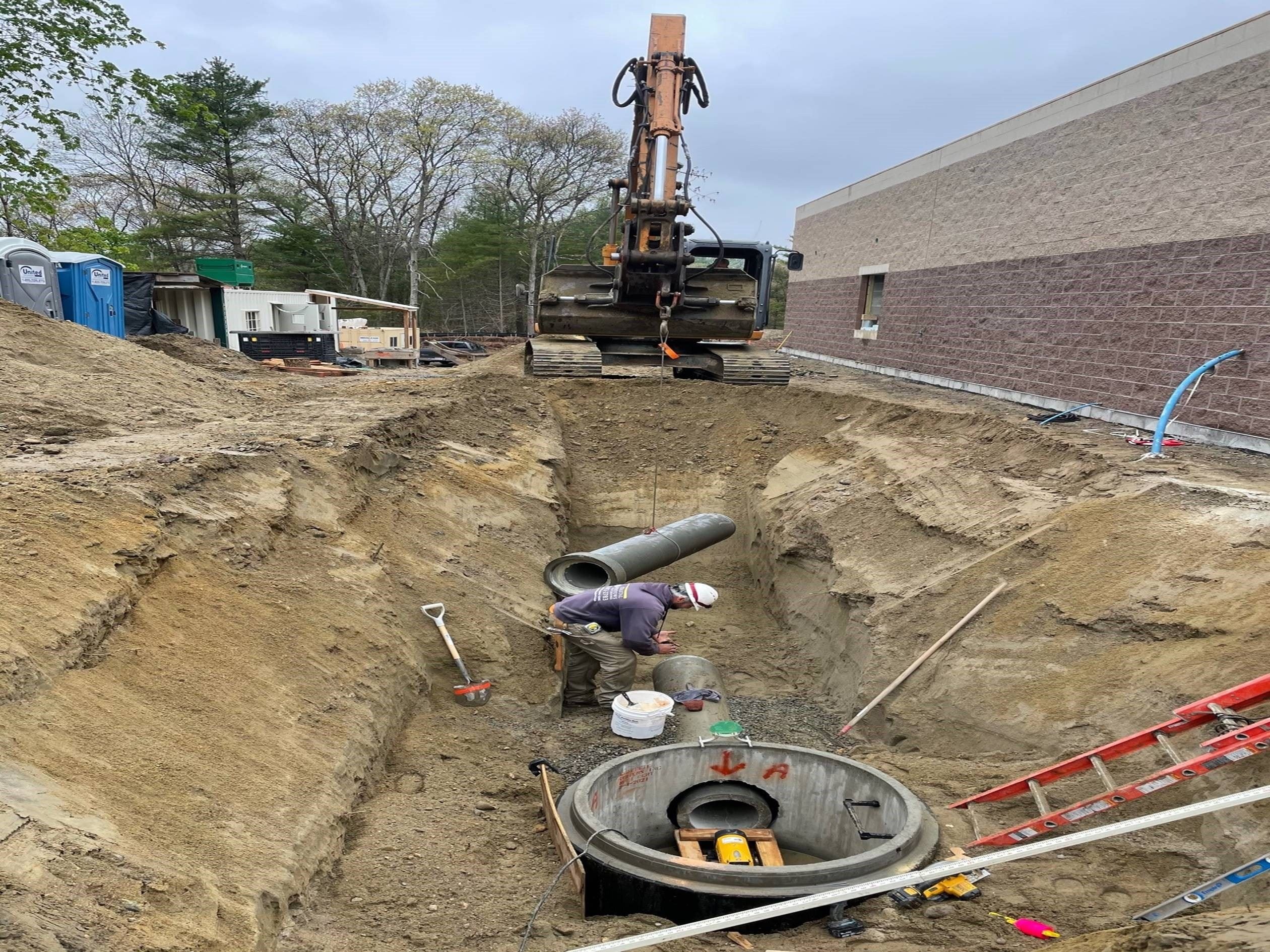 Installation of 12 inch RC pipe and 4 feet diameter DMH